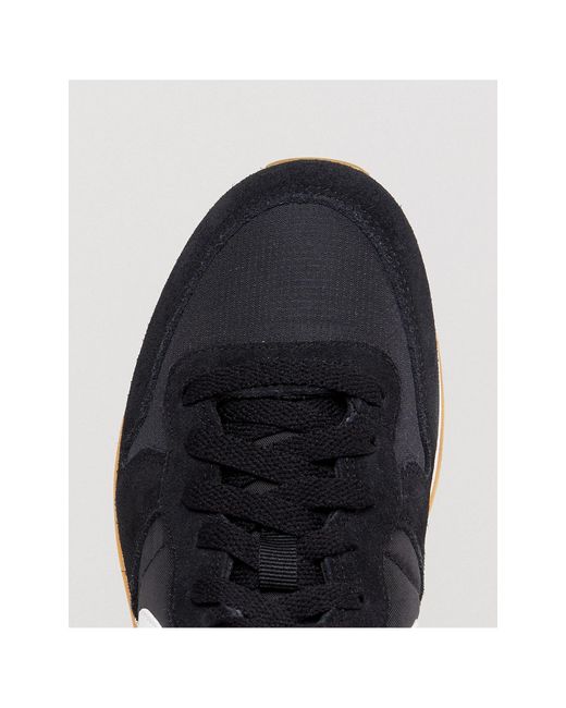 black and white internationalist trainers