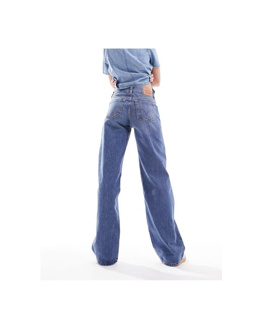 Jeans ampi lavaggio medio con vita super bassa di Levi's in Blue