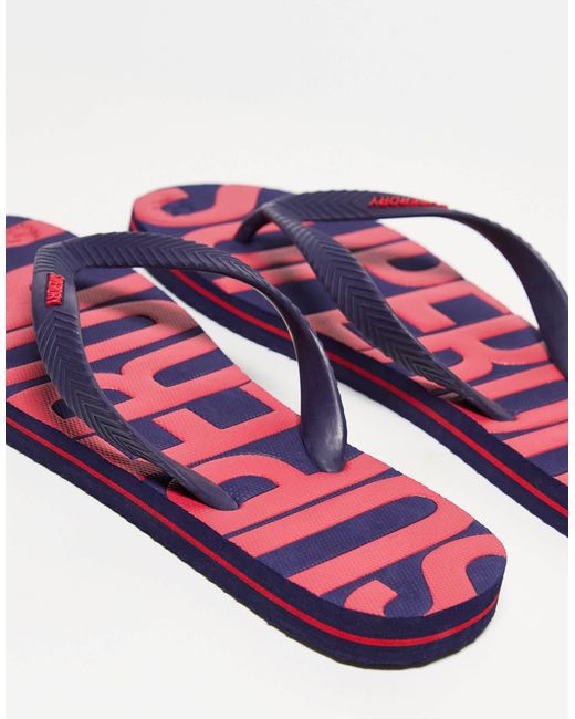 Superdry – vegane vintage-zehenstegsandalen in Pink für Herren