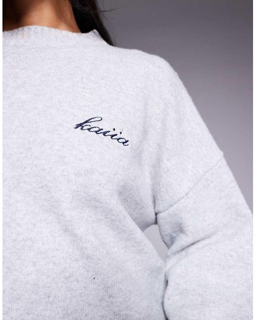 Maglione Girocollo Con Spalle Scese E Logo Ricamato Chiaro di Kaiia in Purple