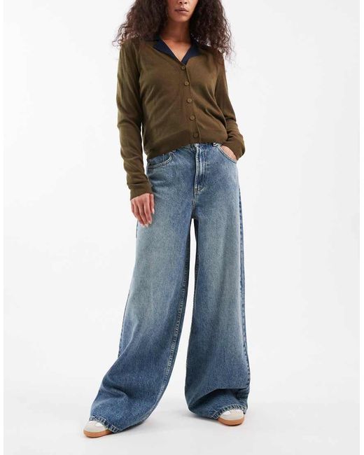 Vaqueros De Pernera Ancha Y Talle Alto Con Lavado Y Detalle De Tira Ajustable De -Azul ASOS de color Blue