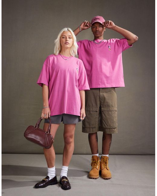 Camiseta rosa lavado unisex extragrande con estampado ASOS de color Pink