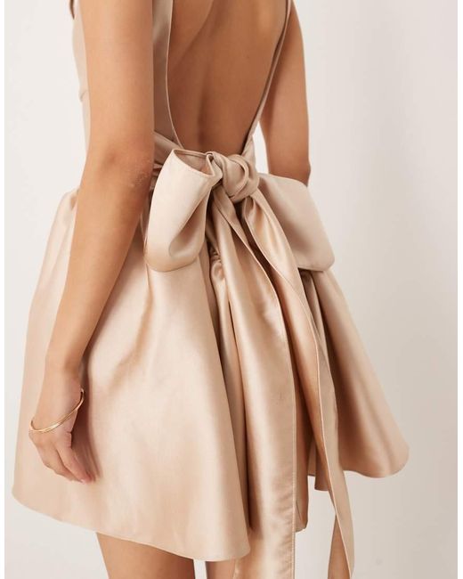 Six Stories Natural Drop Hem Bow Back Mini Dress