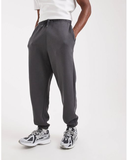 ASOS – essentials – oversize-jogginghose in Black für Herren