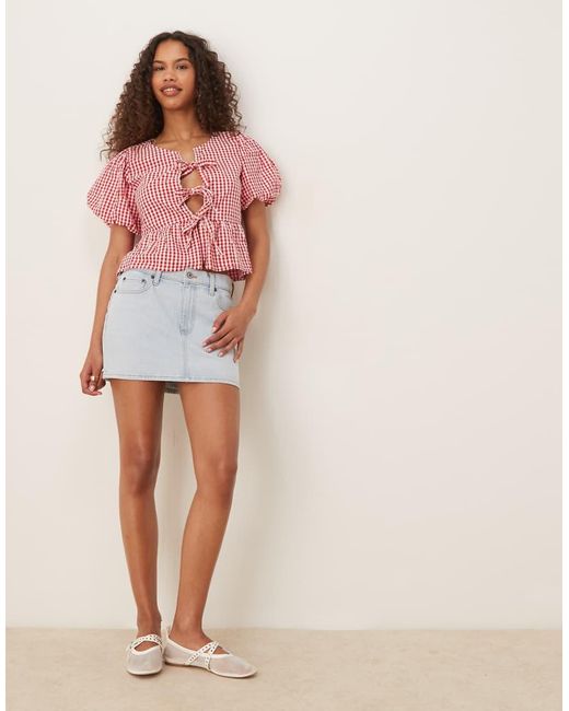 Blusa A De Manga Corta Abullonada Con Lazadas De Gina Tricot de color Red