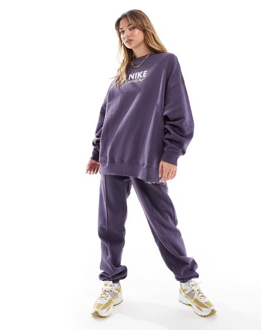 nike swoosh oversized purple tracksuit