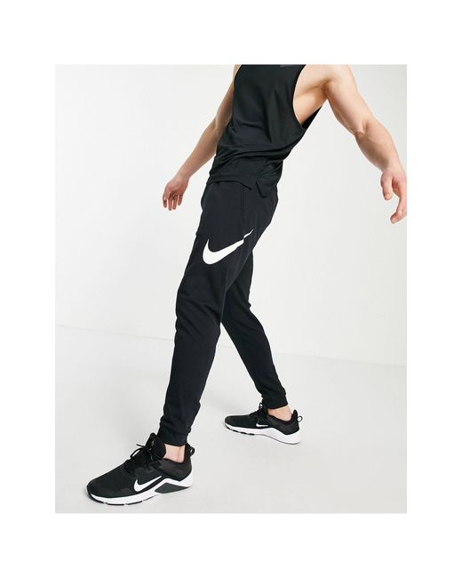 Nike Swoosh joggers in Black for Men | Lyst Canada
