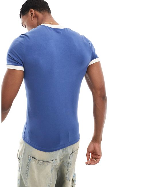 T-shirt attillata stile football con stampa dell'italia di ASOS in Blue da Uomo