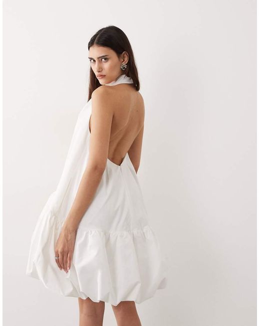 ARRANGE Natural Halter Bubble Hem Mini Dress