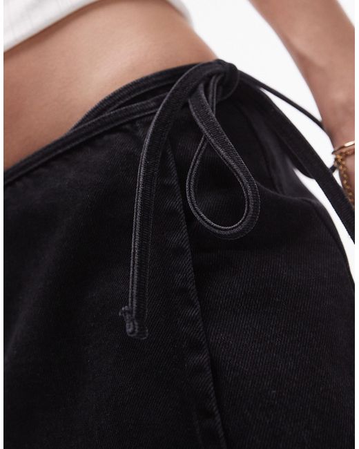 Jupe portefeuille en denim hauteur genou - délavé TOPSHOP en coloris Black