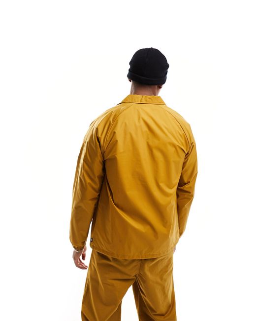 Abrigos vans sales hombre dorados