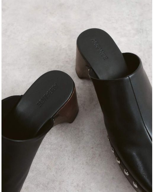 ARRANGE White Leather Studded Clogs
