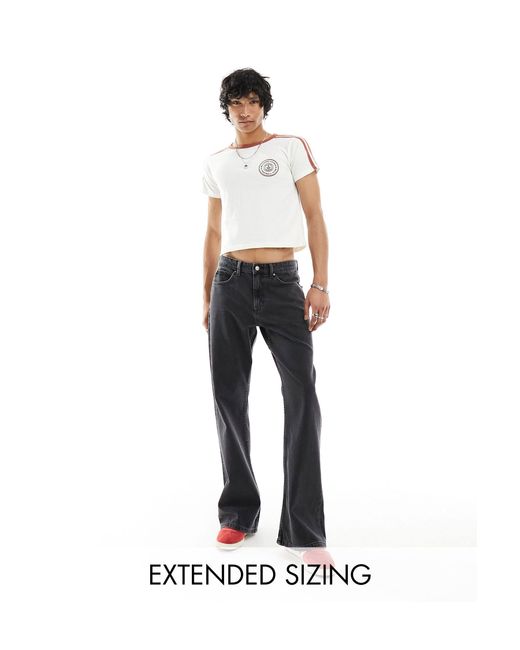 Jeans a zampa con fondo ampio slavato di ASOS in White da Uomo