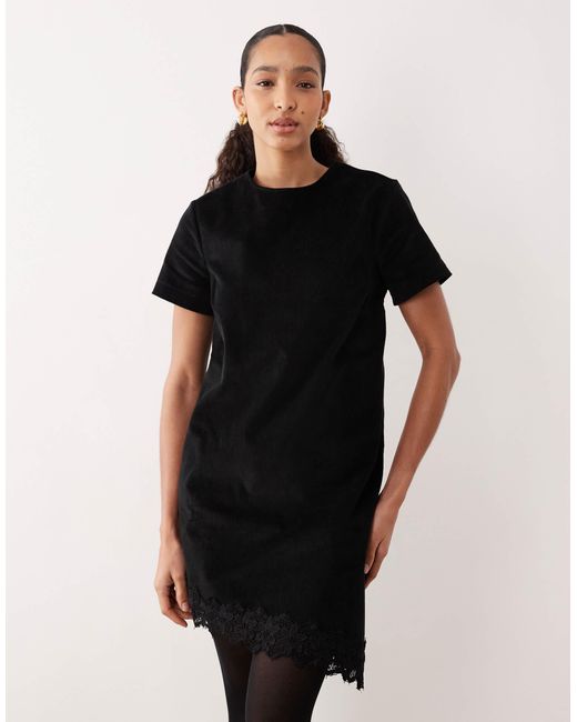 Robe t-shirt mi-longue en velours côtelé avec ourlet asymétrique en dentelle ASOS en coloris Black