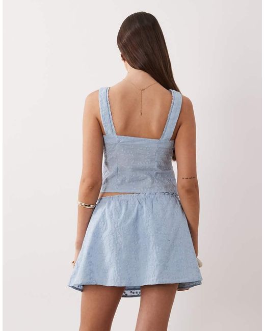 The Frolic Blue Exclusive Cotton Bow Detail Frill Mini Skirt