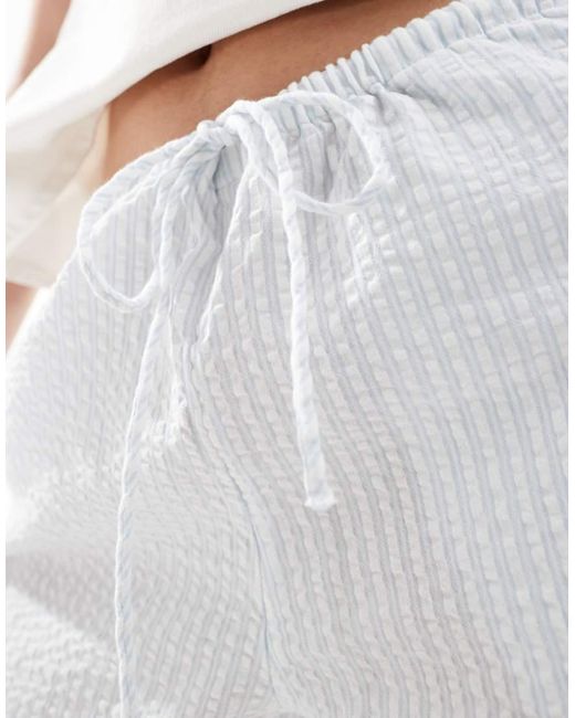 Pantalones Blancos Y Azules A Rayas De Pernera Ancha Con Cordón Ajustable De Sirsaca De Monki de color White