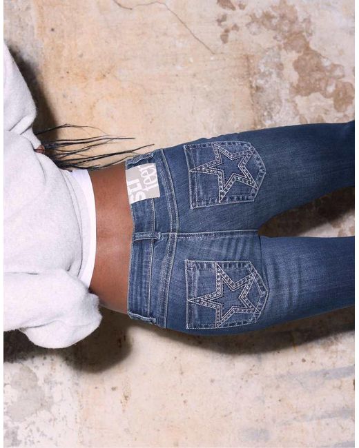 Stradivarius Blue Embroidered Pocket Bell Bottom Jeans