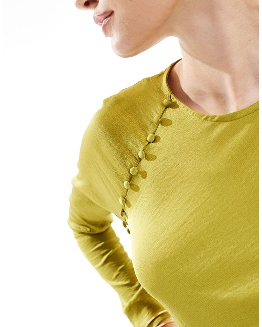 Robe longue coupée en biais en satin avec boutons - chartreuse ASOS en coloris Yellow