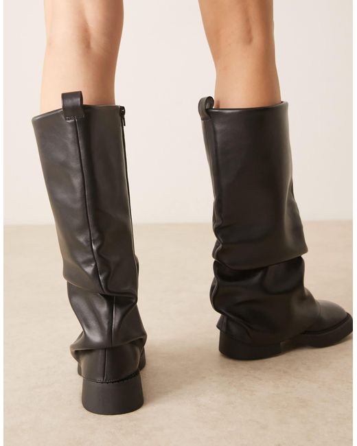 Caden - bottes hauteur genou plates et chunky à rabat ASOS en coloris Black