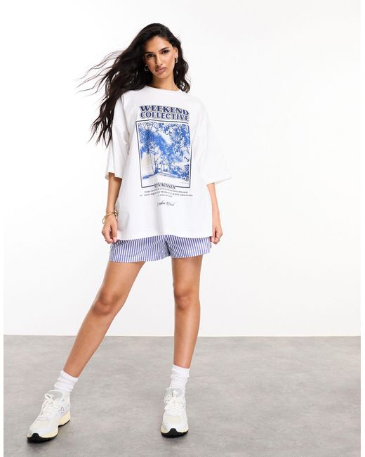 ASOS Blue Asos design – weekend collective – oversize-t-shirt mit "la vacanza"-grafik