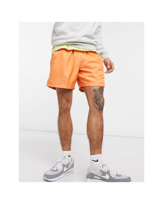 Orange nike shop woven shorts