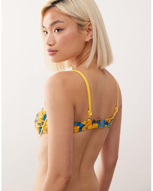 Reclaimed (vintage) Natural – bügel-bikinioberteil mit kontrasteinfassung und fruchtigem zitronenprint
