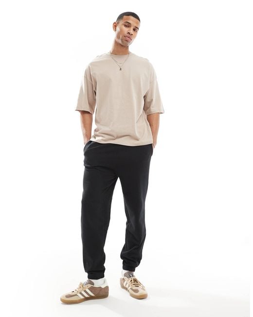 Jack & Jones – lockere jogginghose in Natural für Herren