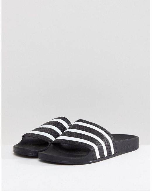 lyst adidas originali adilette cursori in nero 280647 in nero lyst adidas originali adilette cursori in nero 280647 in nero