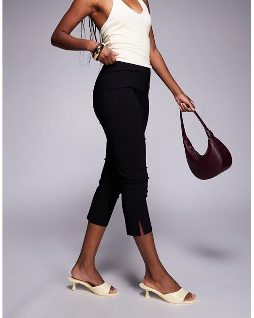 Pantalones Capri Negros De Corte Alargado Con Abertura En El Bajo De Bengalina De ASOS de color Black