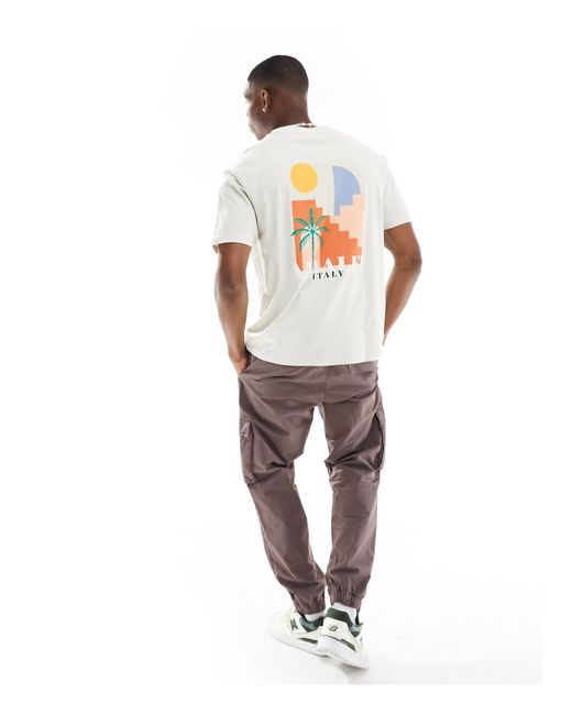 T-shirt squadrata color chiaro con stampa di amalfi di Another Influence in Metallic da Uomo