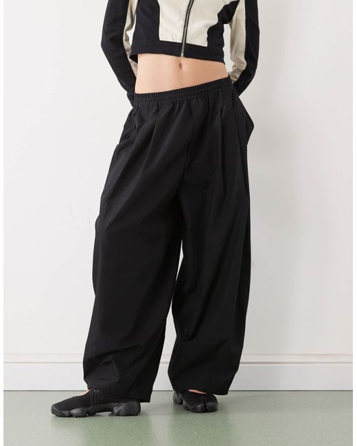 Pantalon ample Collusion en coloris Black
