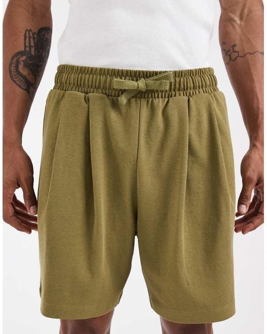 ASOS Green Circular Design Collection Pleated Oversized Jersey Shorts for men