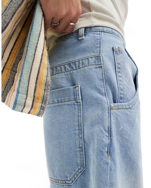 Jorts di jeans taglio lungo lavaggio medio sfumato di ASOS in Blue da Uomo