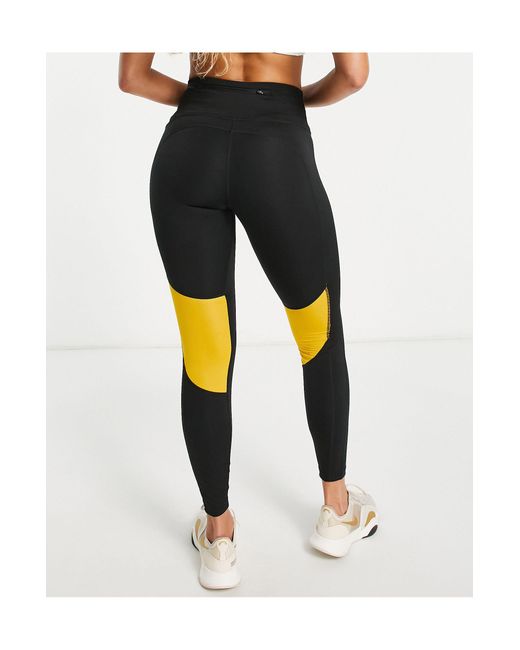 Run fast - legging 7/8 en tissu dri-fit à logo classique et virgule Nike en coloris Black