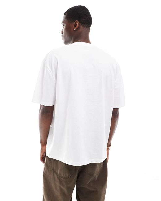 T-shirt oversize bianca con stampa nyc sul petto di ASOS in White da Uomo