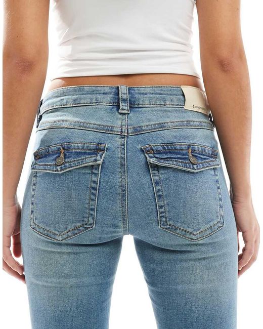 Stradivarius Flared Jeans Met Lage Taille in het Blue