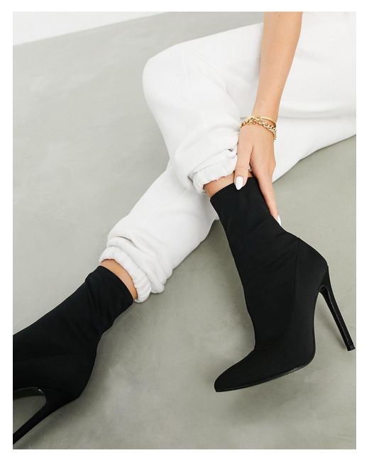 Black stiletto best sale sock boots