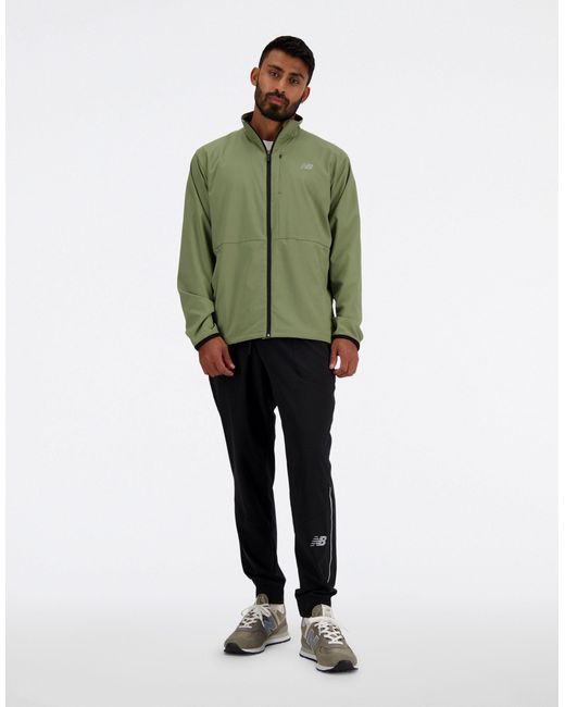 New Balance Green Stretch Woven Jacket for men