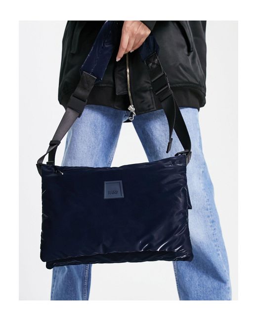 Rains Loop Waterproof Puffer Crossbody Bag in Blue Lyst UK