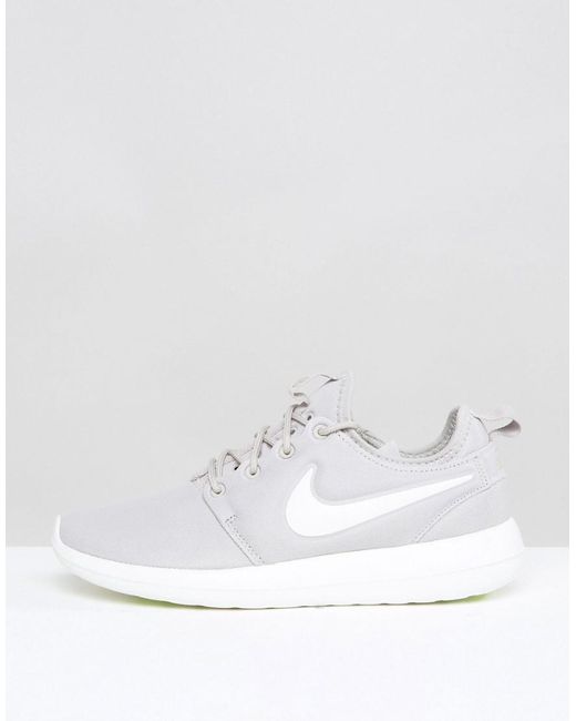 gray nike roshe