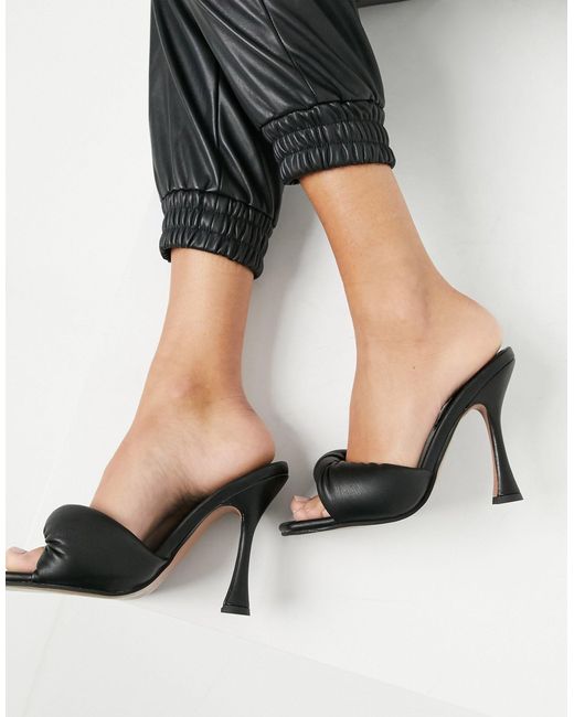 heeled mules black