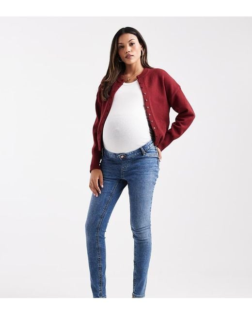 Vaqueros De Corte Pitillo Ultimate De Asos Design Maternity ASOS de color Blue