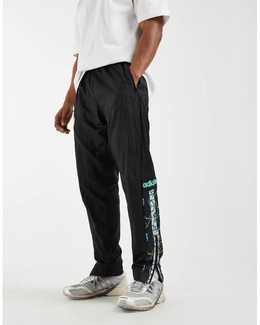 Adidas Originals Black Manchester United Woven 90 Trousers for men