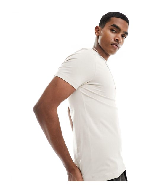 Camiseta color piedra ajustada ASOS de hombre de color White