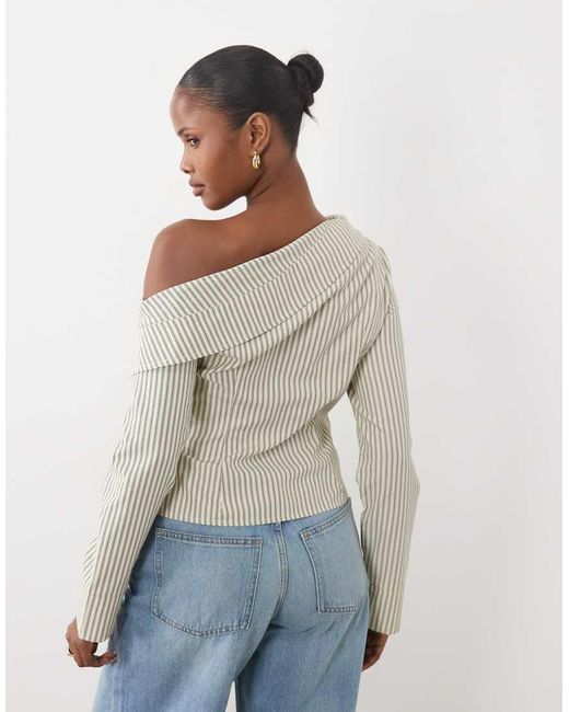 The Frolic White Exclusive Asymmetric Off Shoulder Detail Split Front Flare Sleeve Shirt