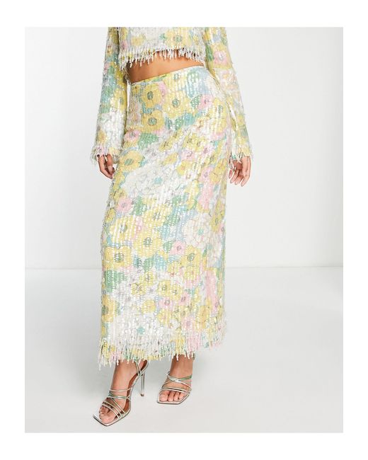 Falda midi con estampado floral en tonos pastel y flecos ASOS de color Multicolor