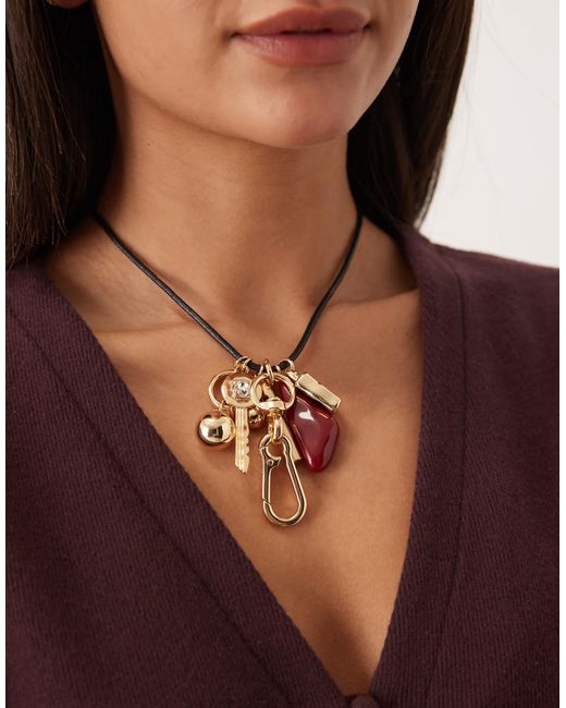 Collier à breloque Mango en coloris Brown