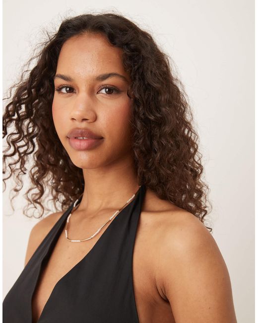 Robe longueur mollet dos nu en coton à taille basse et corsage structuré Mango en coloris Natural