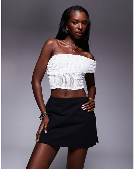 Gigi - mini jupe-short fendue sur le côté en coton Princess Polly en coloris Black