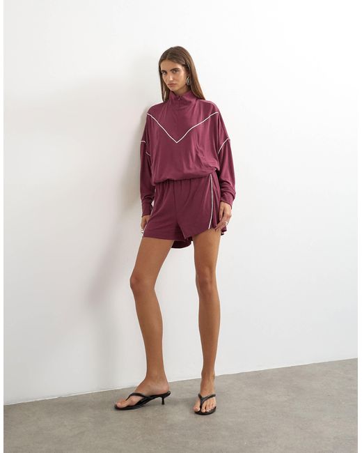 Top sporty à demi-zip avec passepoil coordonné en bordeaux TOPSHOP en coloris Red